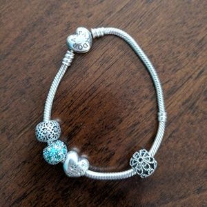 Pandora bracelet with 4 charms